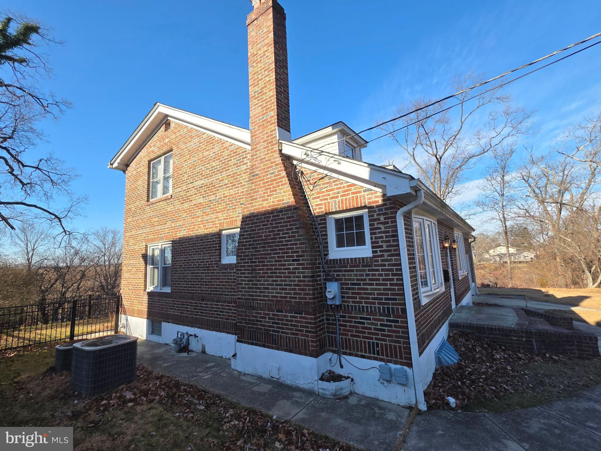 167 Singley Avenue Runnemede, NJ 08078 - Photo 7 of 56 a front view of a house with a yard