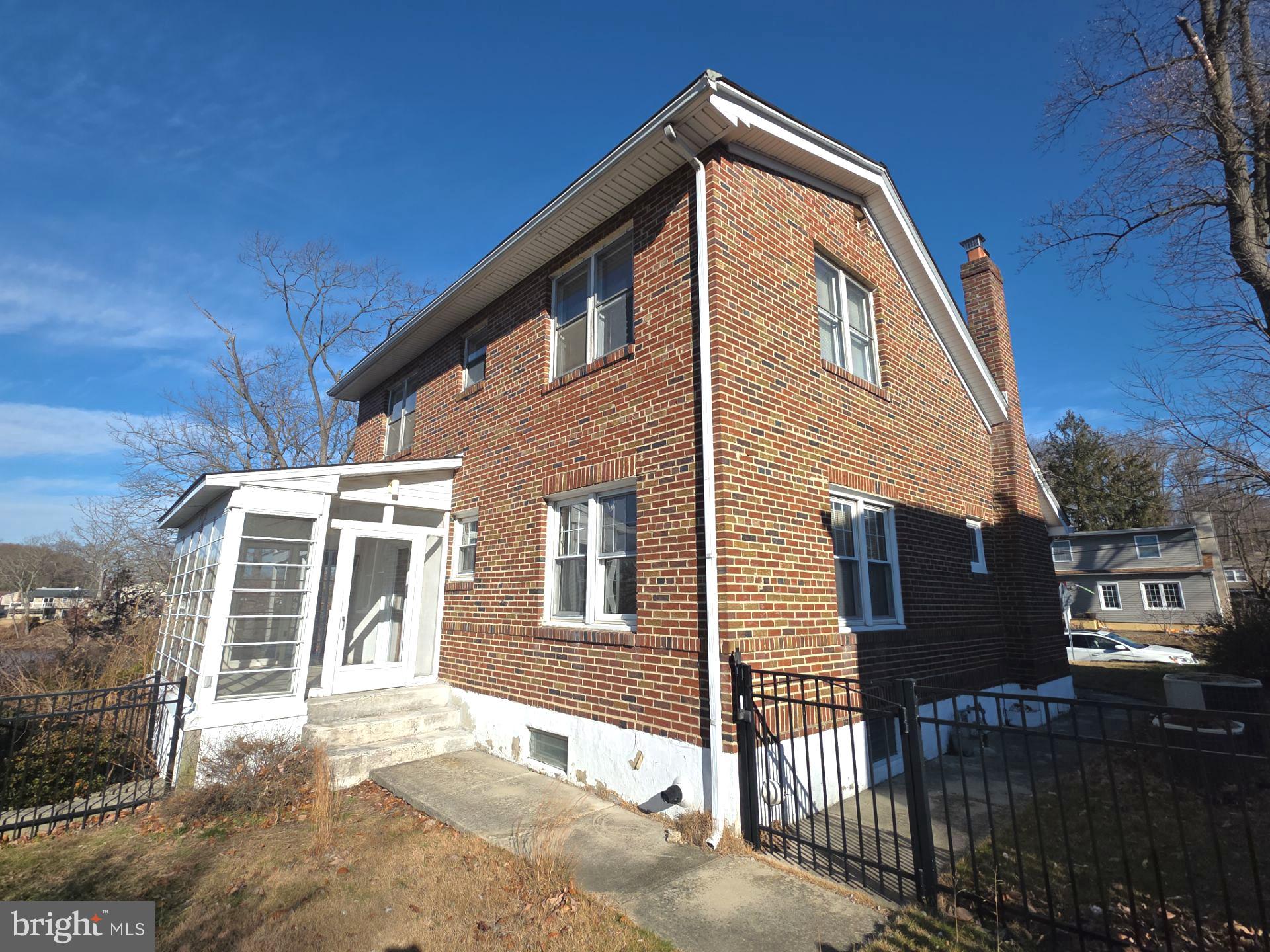 167 Singley Avenue Runnemede, NJ 08078 - Photo 8 of 56 a front view of a house with glass door