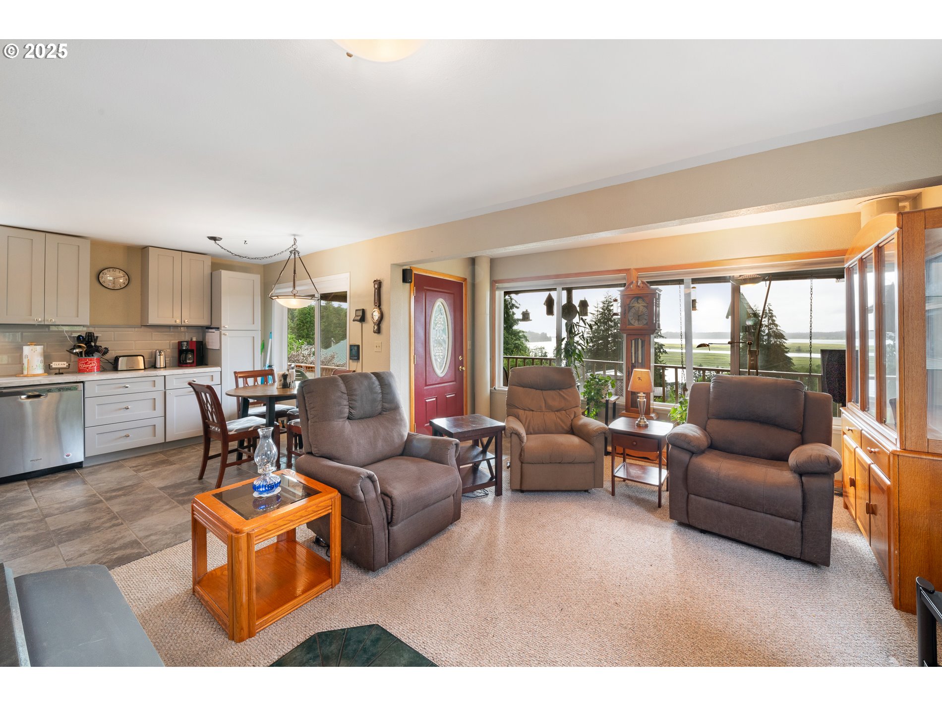 336 Gregory Street Wheeler, OR 97147 - Photo 13 of 42 a living room with furniture and a large window