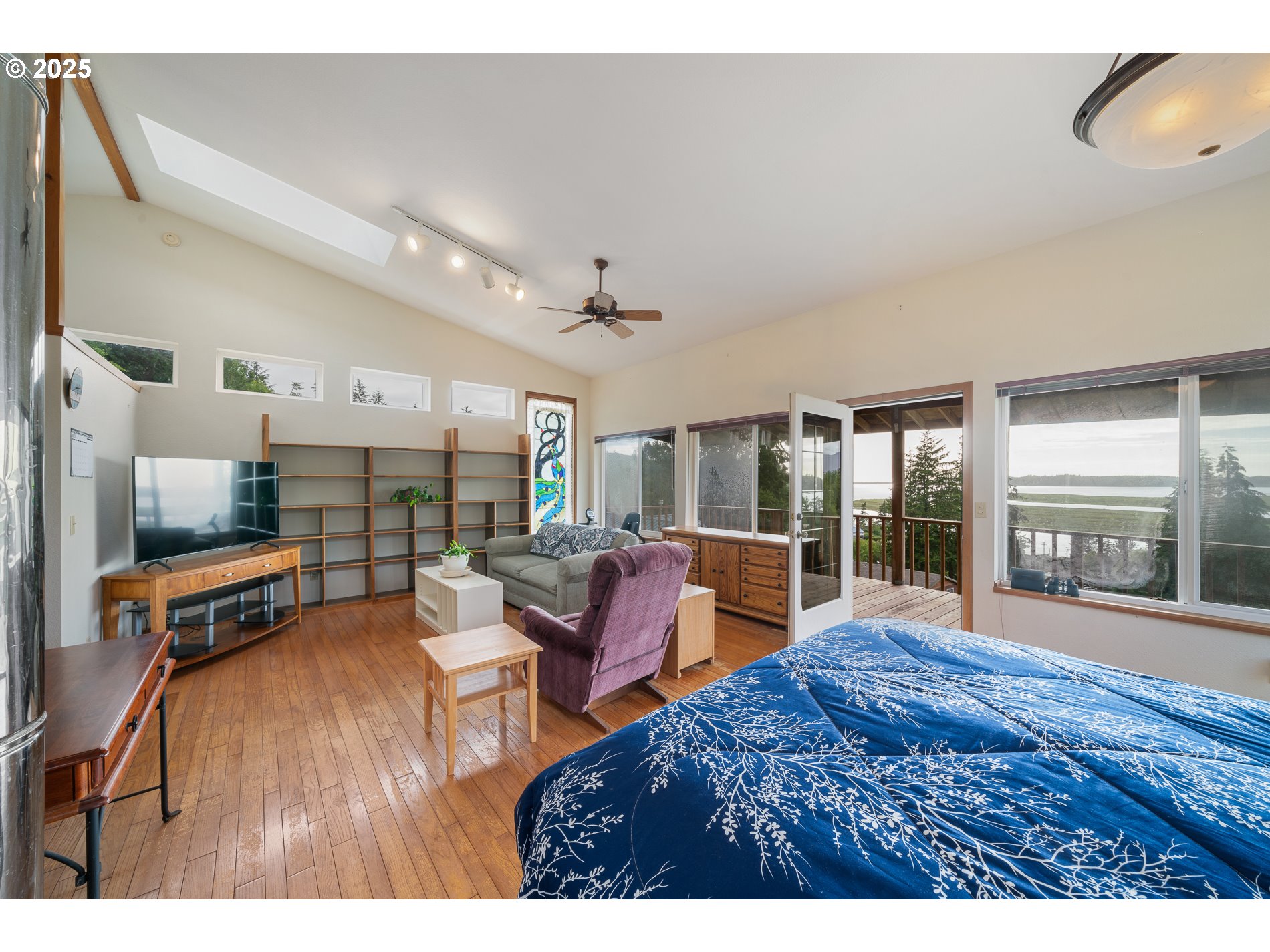 336 Gregory Street Wheeler, OR 97147 - Photo 16 of 42 a living room with furniture and a wooden floor