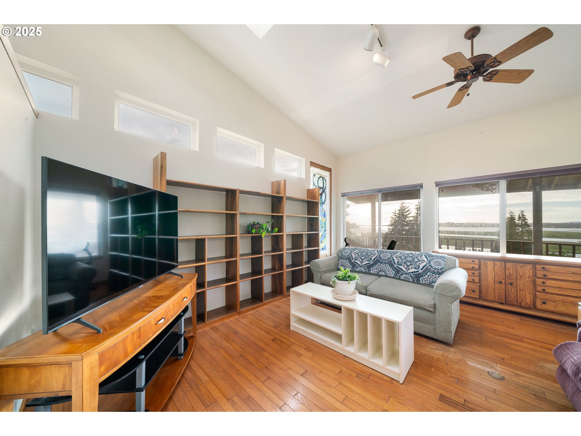336 Gregory Street Wheeler, OR 97147 - Photo 19 of 42 a living room with furniture and a window