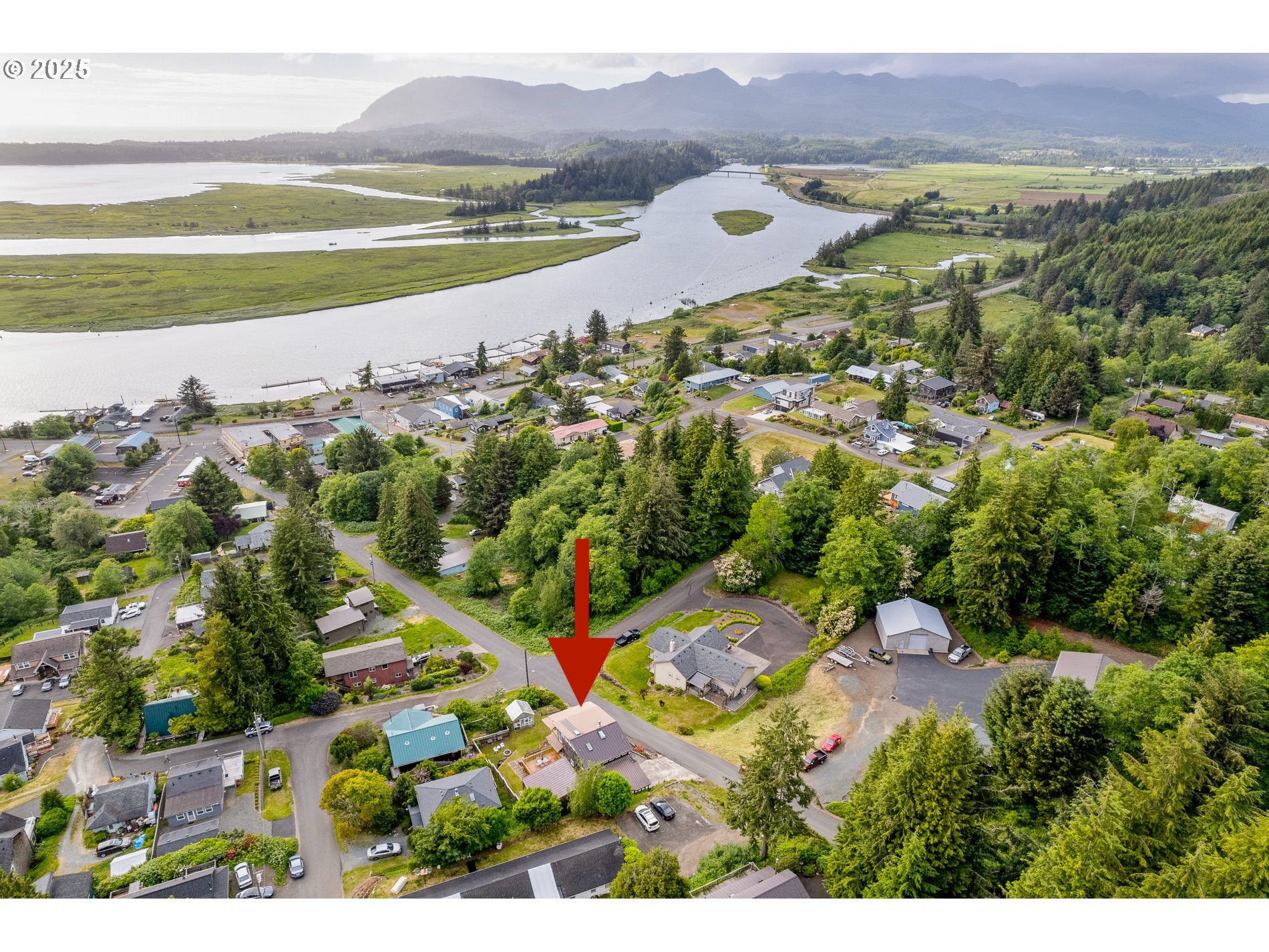 336 Gregory Street Wheeler, OR 97147 - Photo 2 of 42 a view of lake and mountain