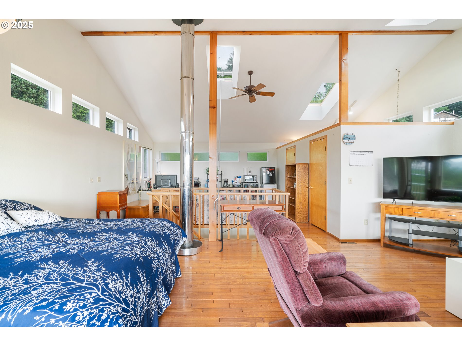 336 Gregory Street Wheeler, OR 97147 - Photo 21 of 42 a bedroom with furniture and a large window