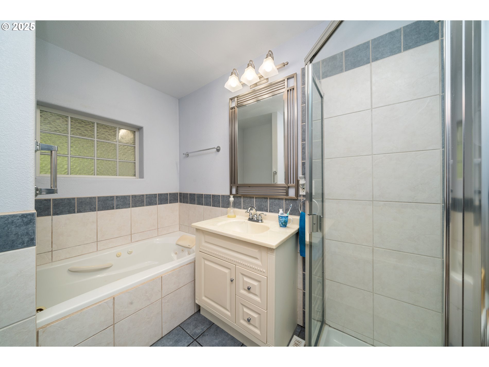 336 Gregory Street Wheeler, OR 97147 - Photo 29 of 42 a bathroom with a sink and a mirror