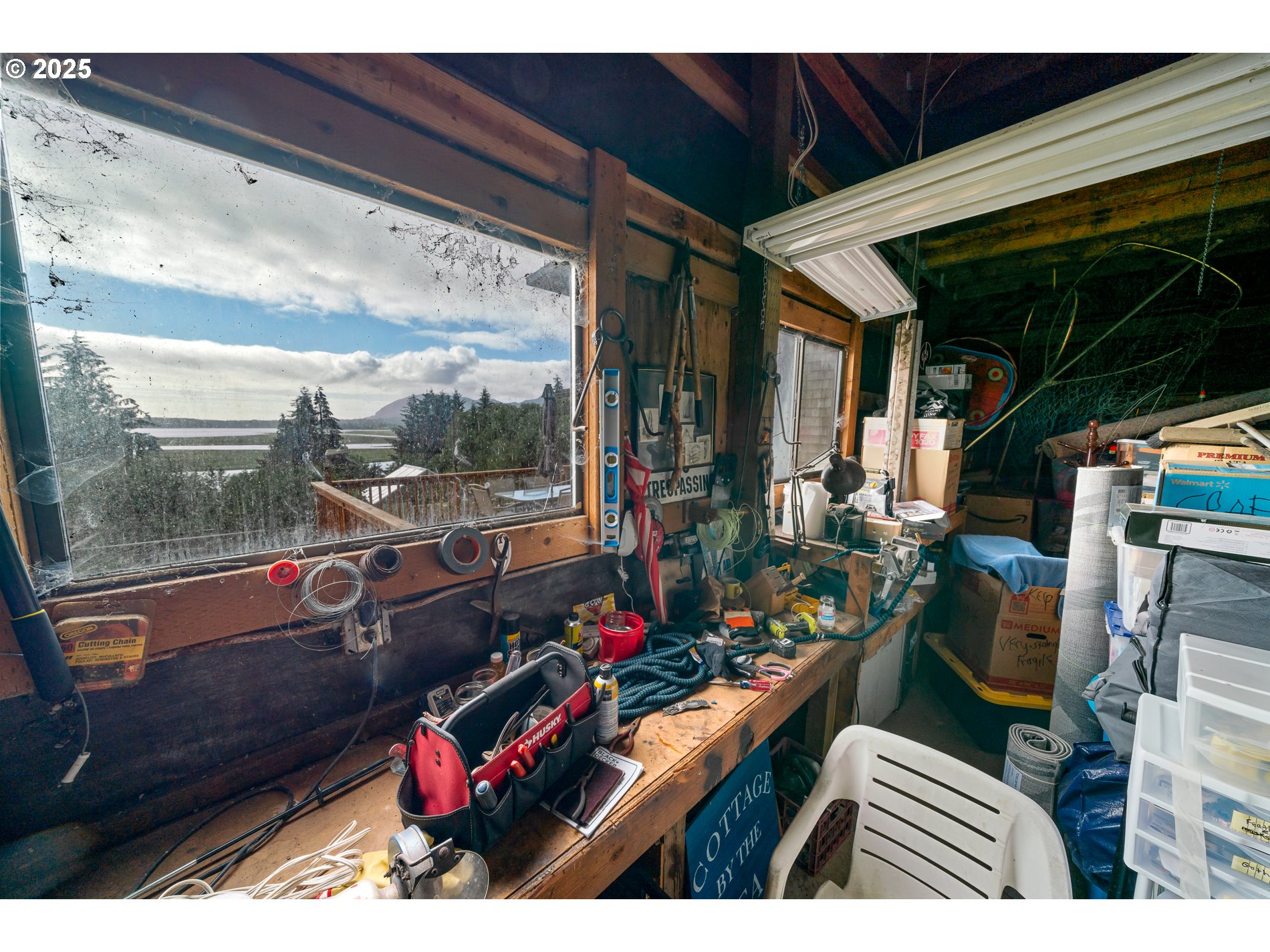 336 Gregory Street Wheeler, OR 97147 - Photo 35 of 42 a room with lots of wooden furniture
