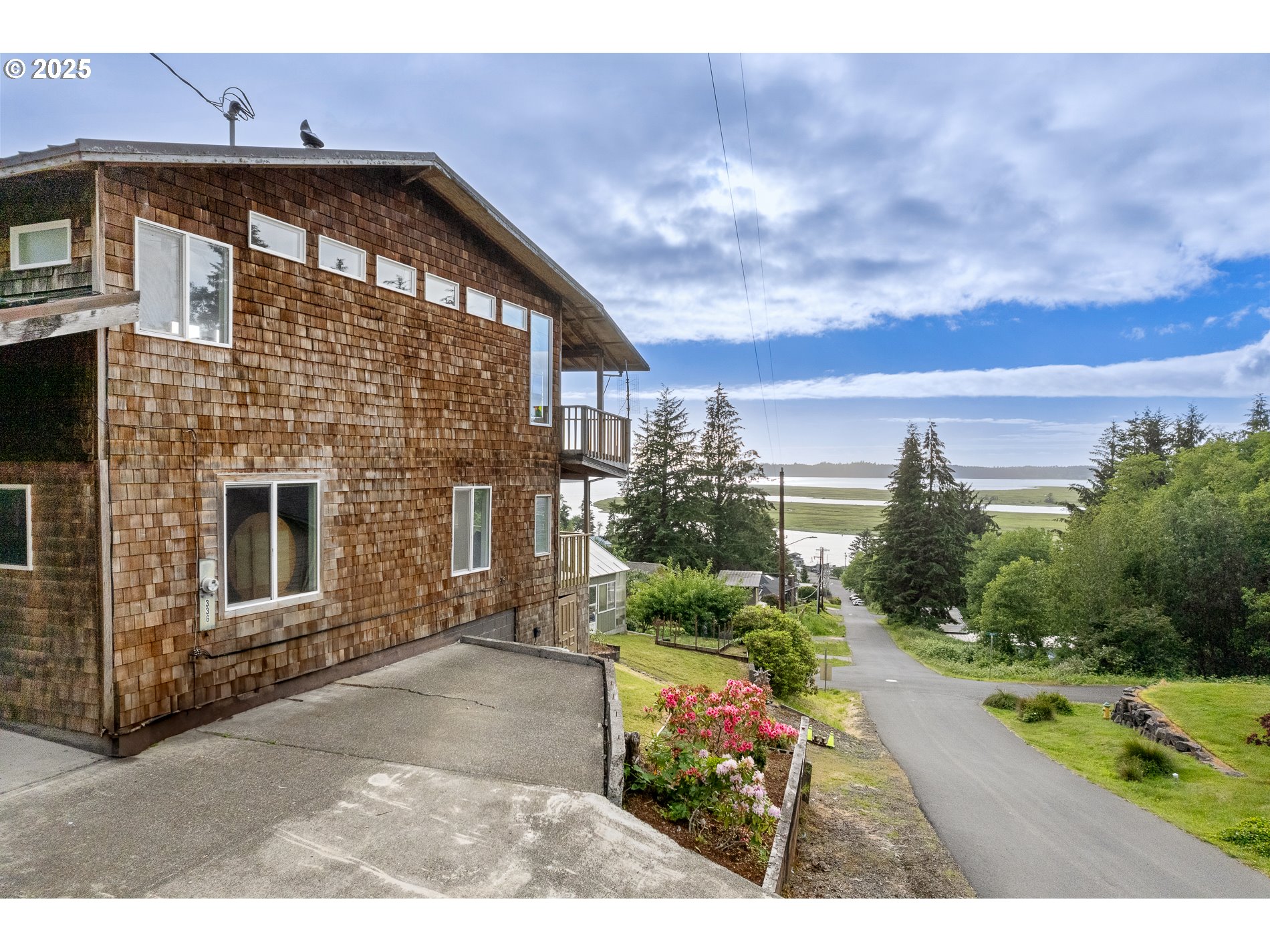 336 Gregory Street Wheeler, OR 97147 - Photo 42 of 42 a front view of a house with a yard