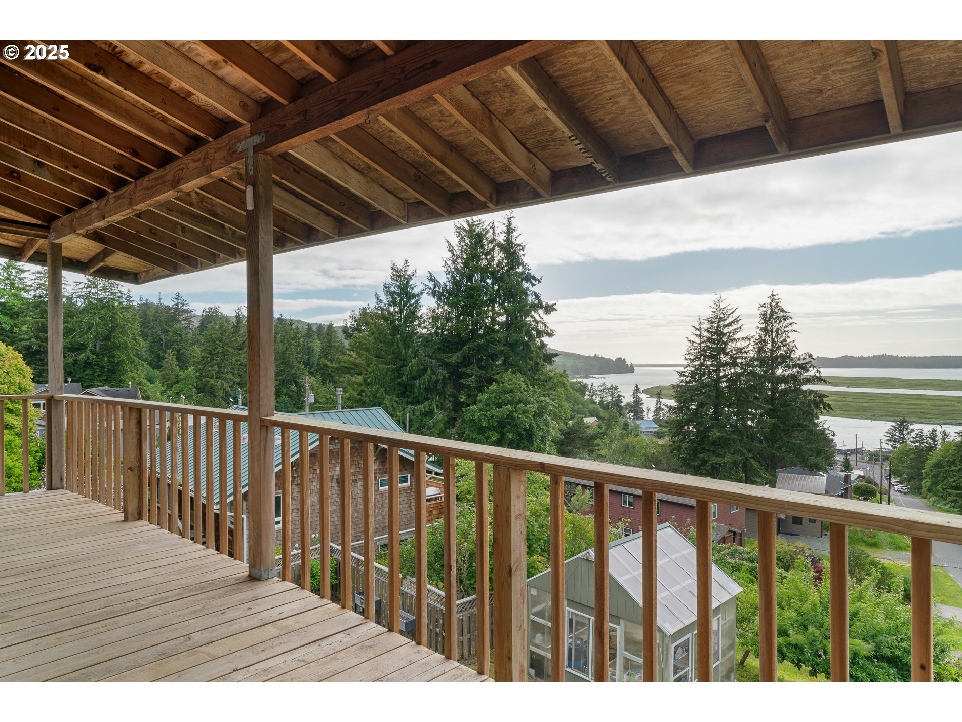 336 Gregory Street Wheeler, OR 97147 - Photo 6 of 42 a view of balcony with wooden floor