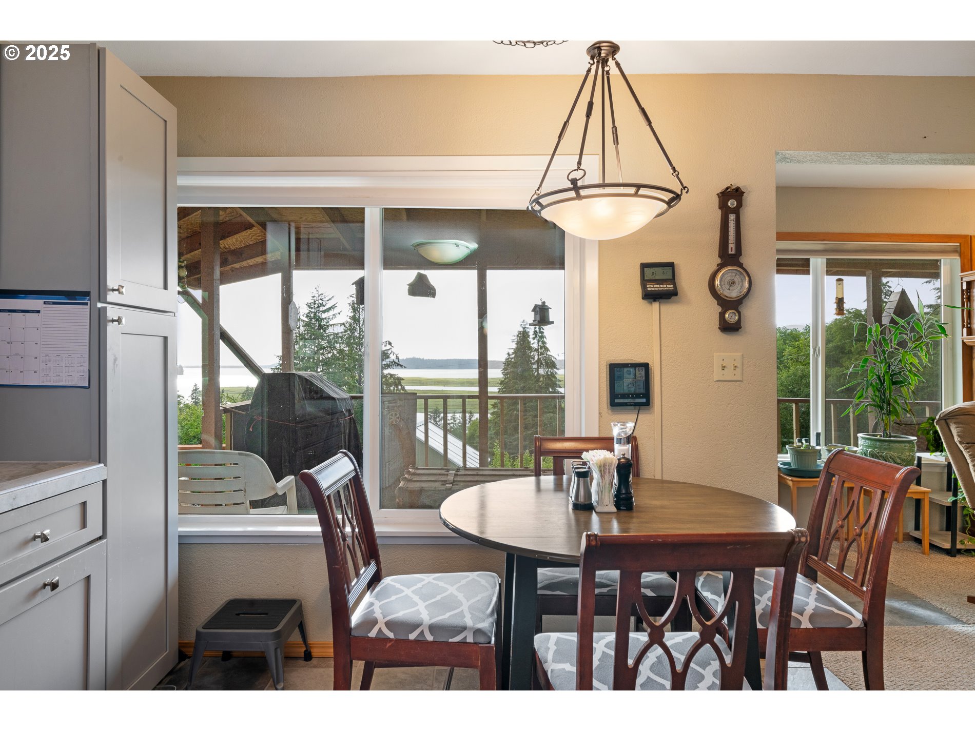 336 Gregory Street Wheeler, OR 97147 - Photo 8 of 42 a view of a dining room with furniture window and outside view