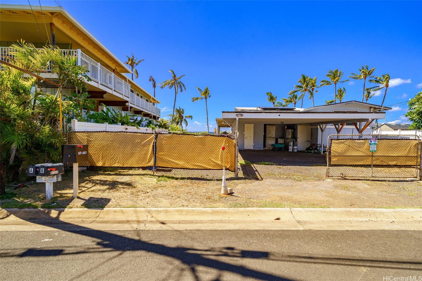 67-267 Kahaone Loop, Unit 2 Waialua, HI 96791 - Photo 20 of 20 a view of a swimming pool with a patio