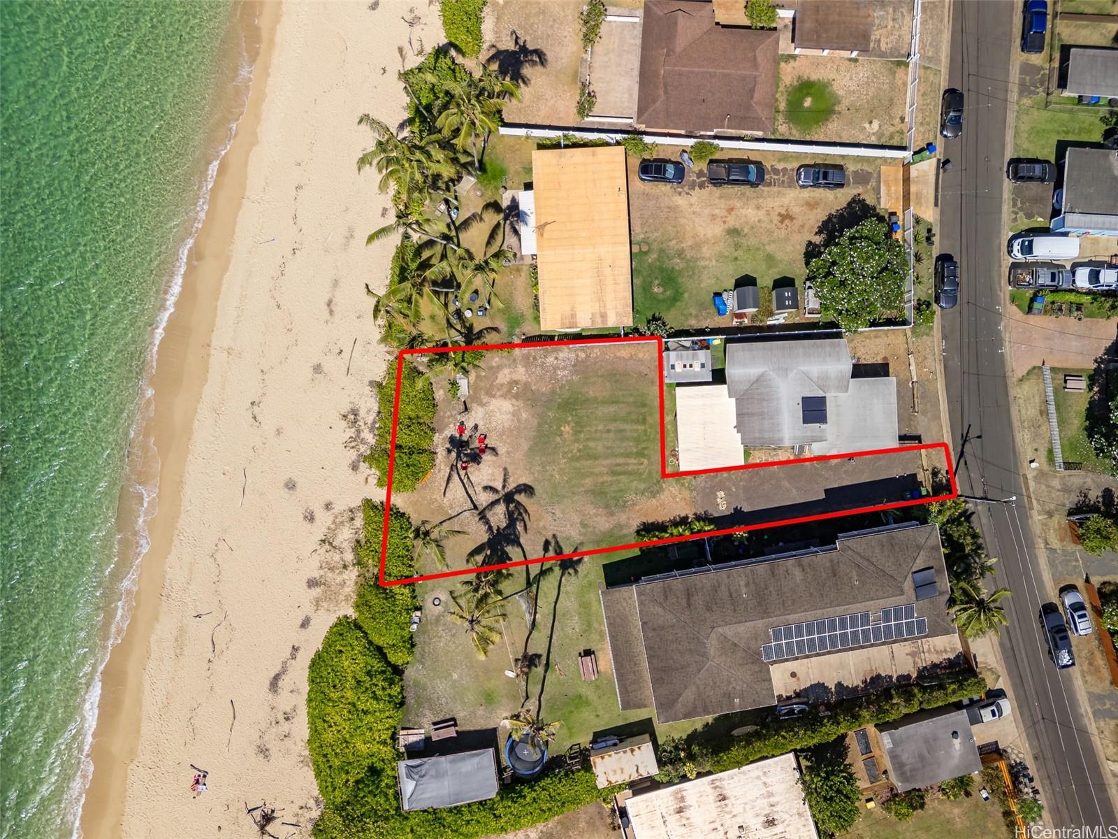 67-267 Kahaone Loop, Unit 2 Waialua, HI 96791 - Photo 4 of 20 an aerial view of a house with a yard