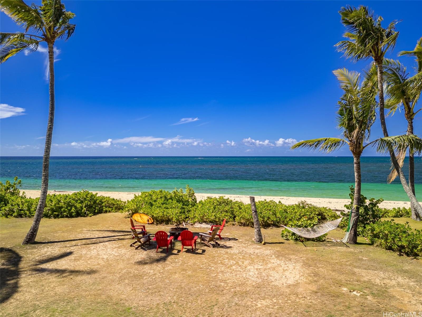67-267 Kahaone Loop, Unit 2 Waialua, HI 96791 - Photo 10 of 20 a view of a lake with a outdoor space