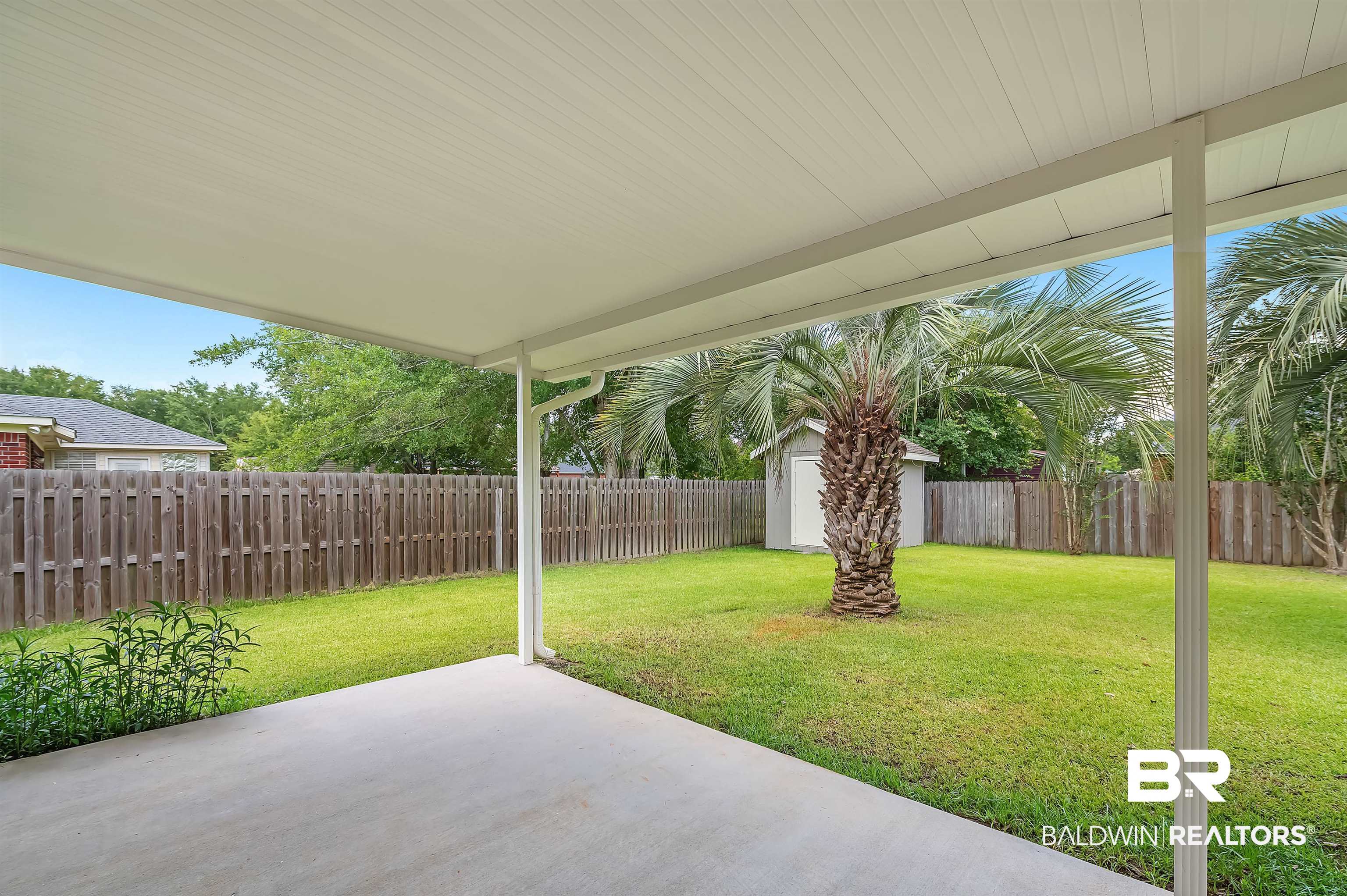 1502 Mulberry Lane Foley, AL 36535 - Photo 40 of 45 View of patio featuring a storage shed