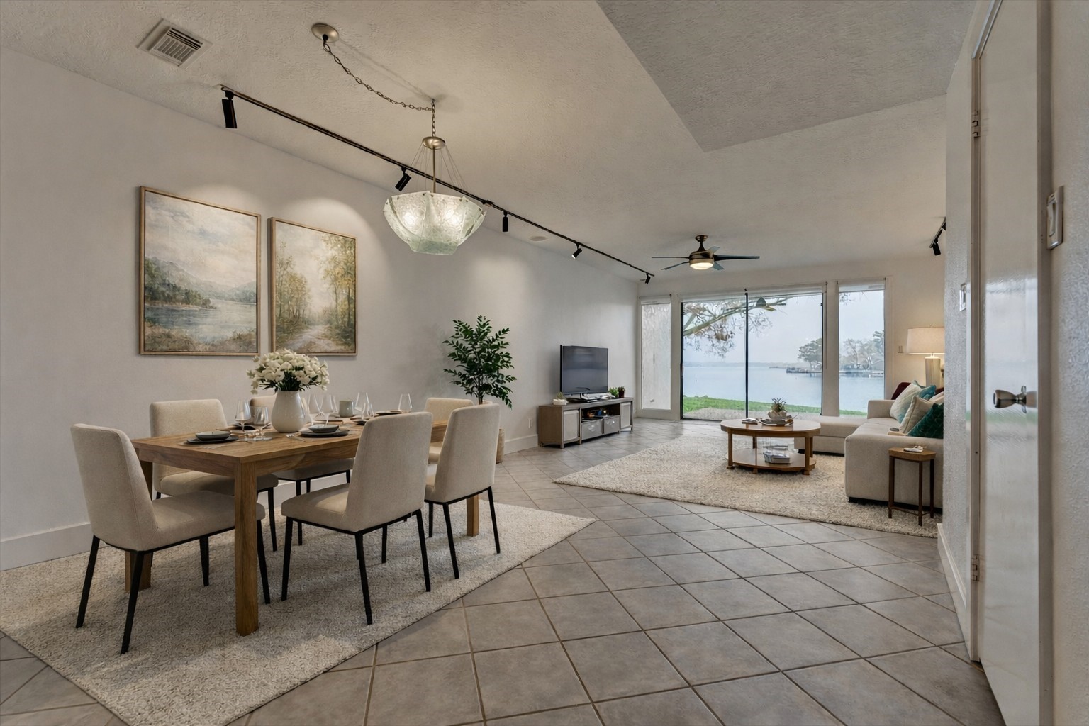 1427 Bowsprit Point Willis, TX 77318 - Photo 14 of 47 The open living and dining spaces seamlessly flow into one another. Virtually staged.