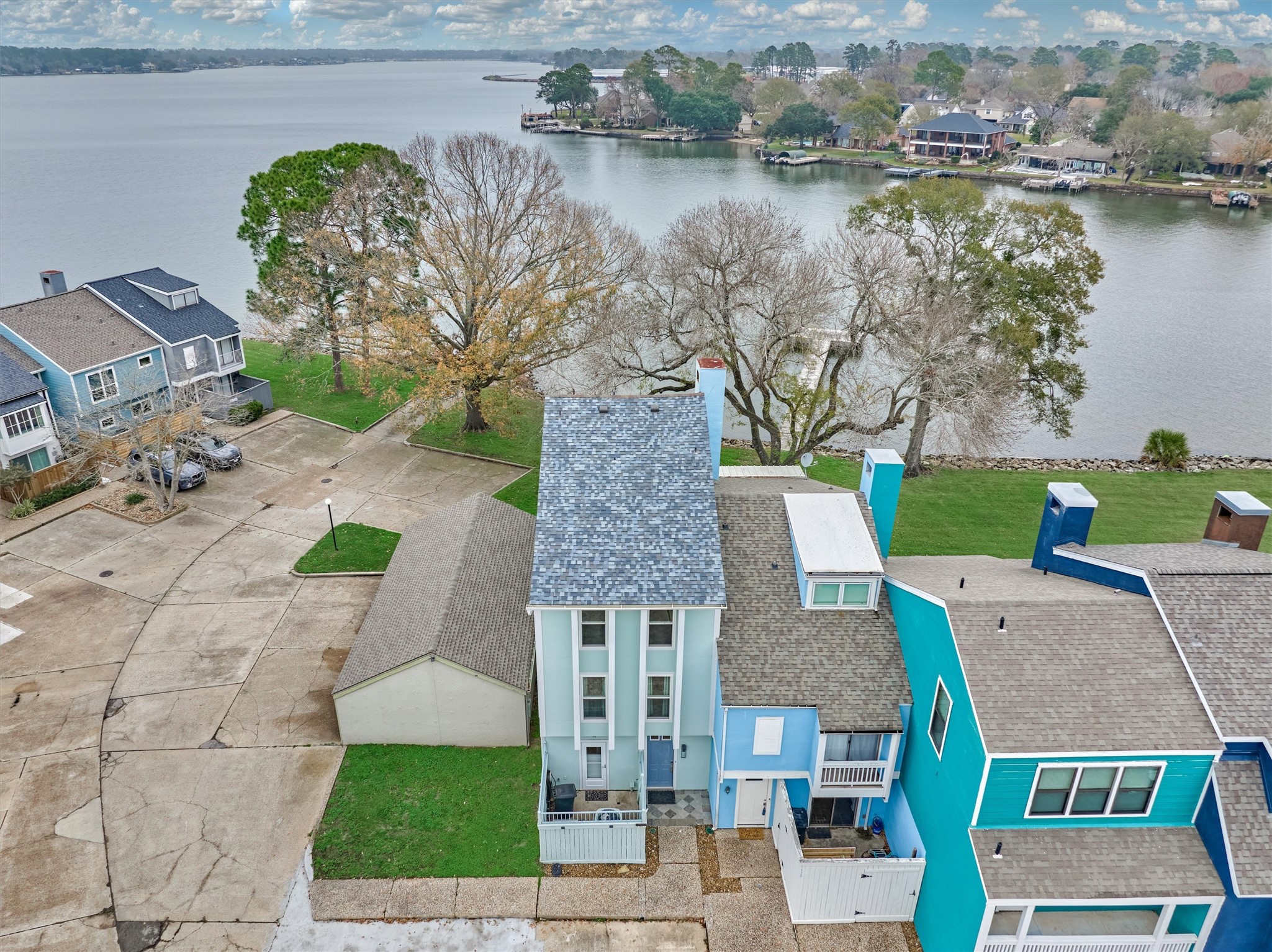 1427 Bowsprit Point Willis, TX 77318 - Photo 2 of 47 One of the two boat ramps in the neighborhood is adjacent to the townhome allowing for convenience to the lake and great people watching!