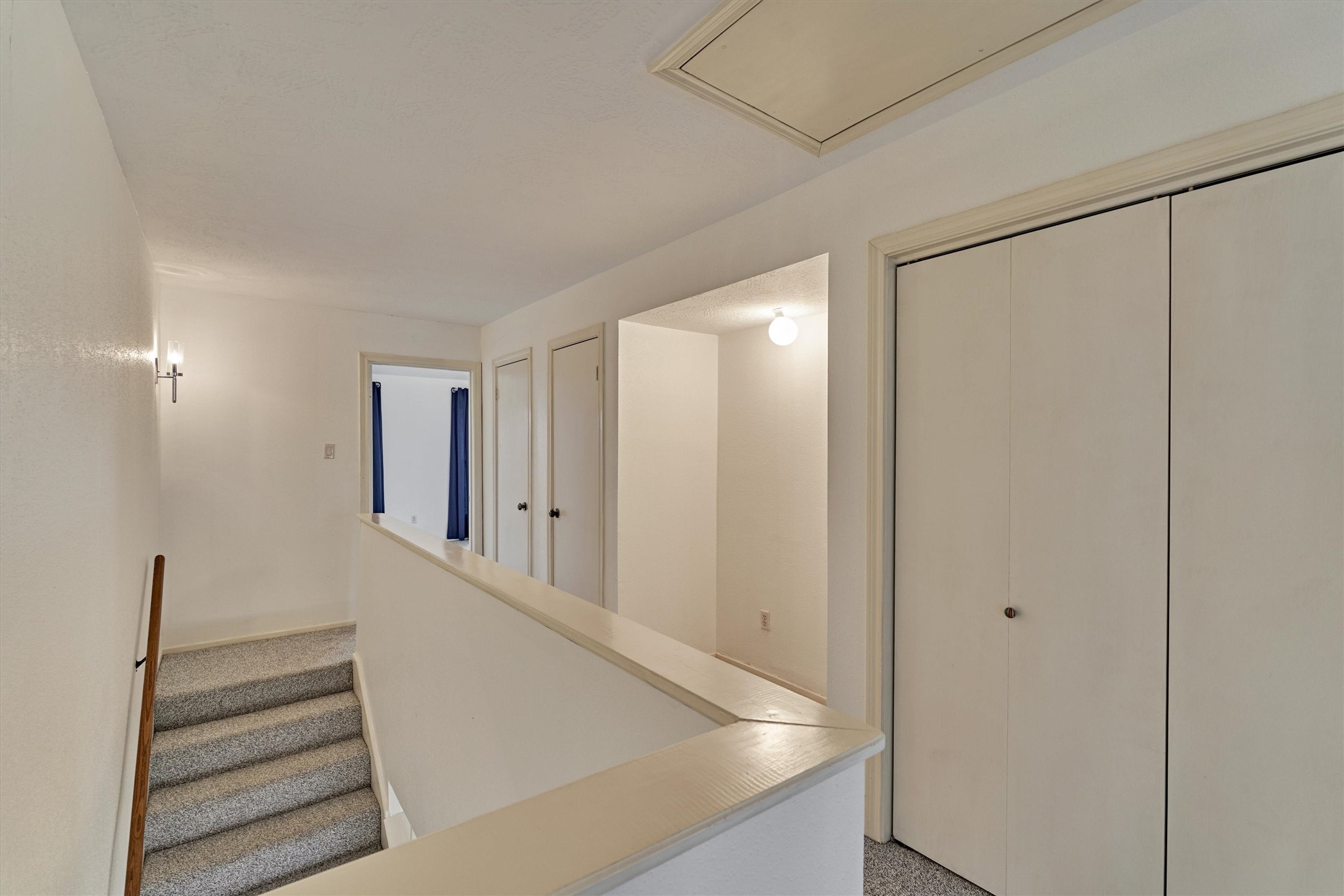 1427 Bowsprit Point Willis, TX 77318 - Photo 28 of 47 On the third level, there are more closets along the hallway along with a nook for a desk, shelving or table.