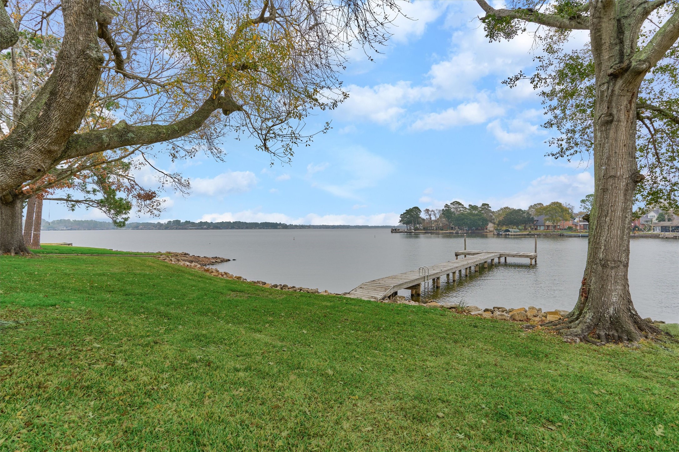 1427 Bowsprit Point Willis, TX 77318 - Photo 38 of 47 The wooden pier just outside of the home is a great place to tie up your boat temporarily or relax and enjoy a picnic by the water!