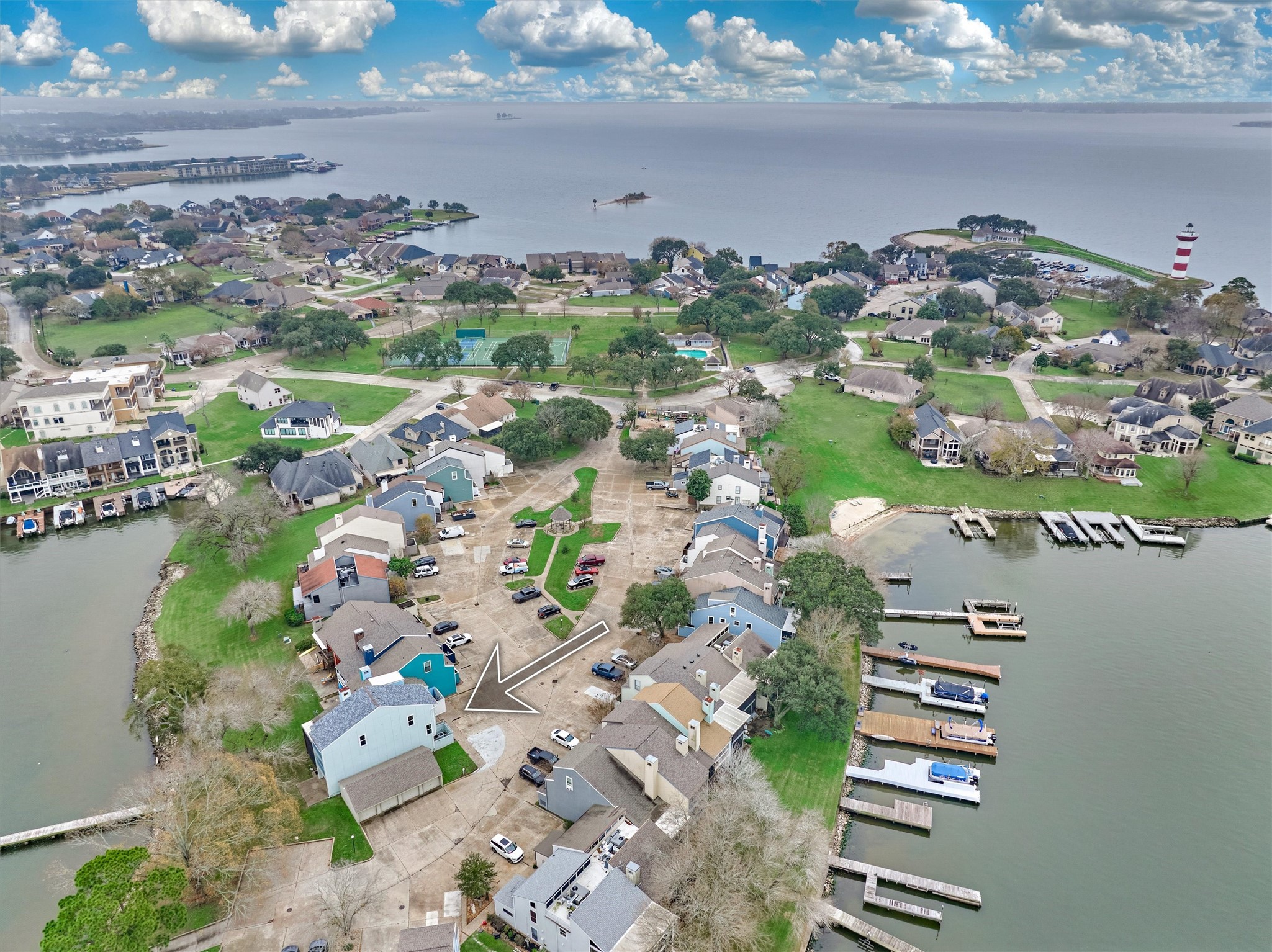 1427 Bowsprit Point Willis, TX 77318 - Photo 4 of 47 Just a short boat ride to the open waters of Lake Conroe, this home sits in a quiet cove of the lake for minimum boat traffic. The iconic Lake Conroe lighthouse can be seen above right and is close to the community marina for convenient boat storage.