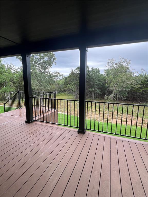 900 Chamberlin Road Dale, TX 78616 - Photo 13 of 14 a view of balcony with wooden floor
