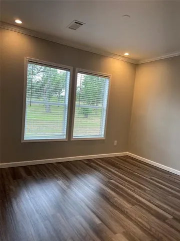 a bathroom with a granite countertop toilet sink and bathtub