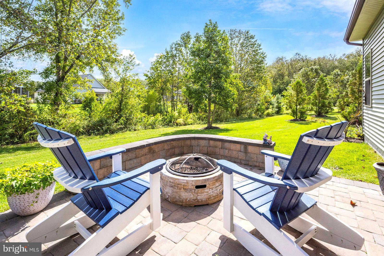 23546 Robalo Road Frankford, DE 19945 - Photo 13 of 78 a view of a swimming pool with a patio