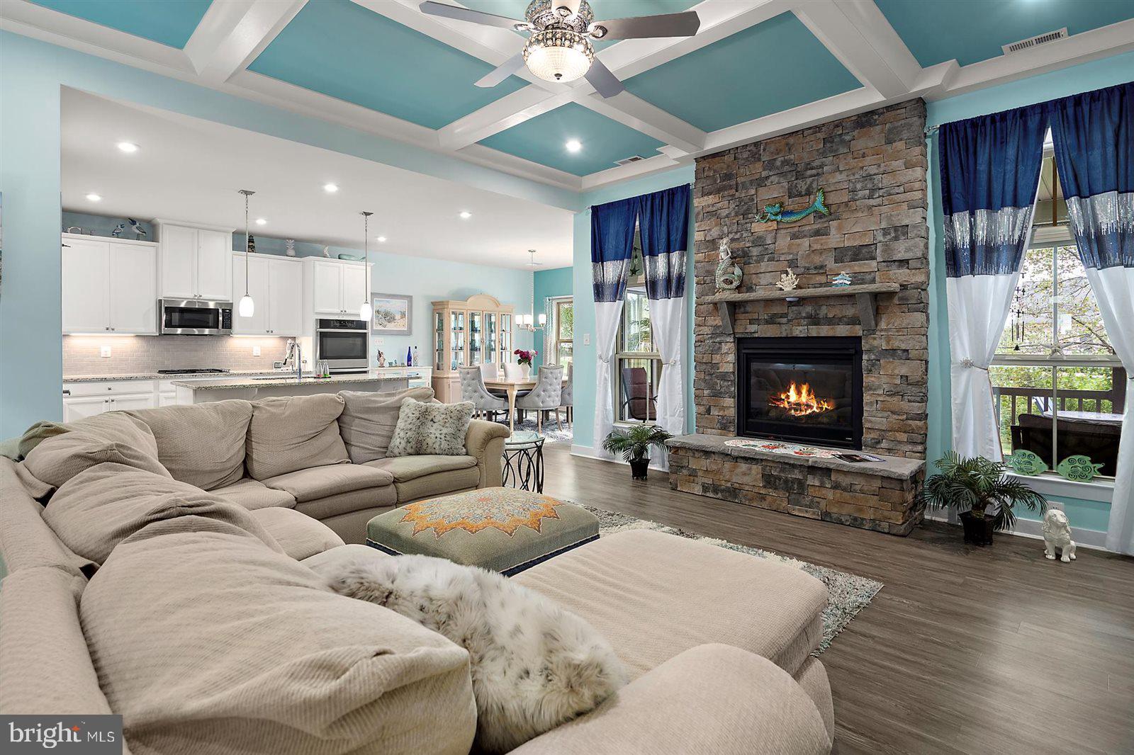 23546 Robalo Road Frankford, DE 19945 - Photo 17 of 78 a living room with furniture and a fireplace