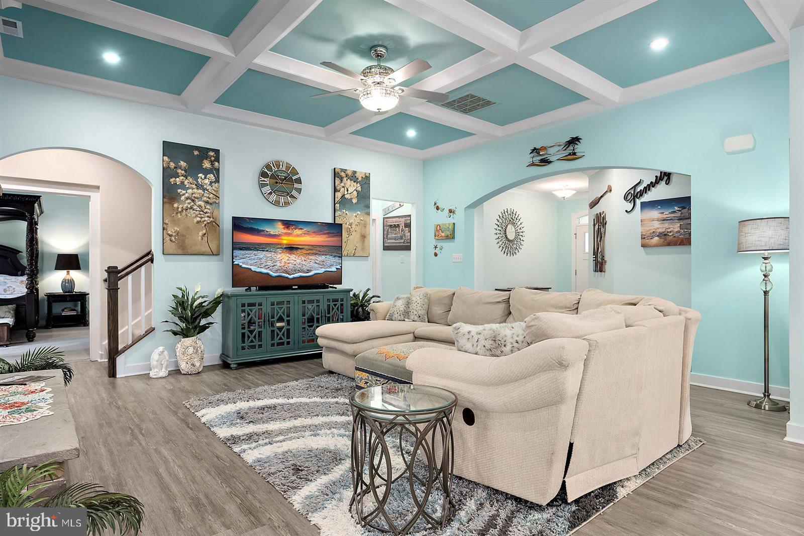 23546 Robalo Road Frankford, DE 19945 - Photo 22 of 78 a living room with furniture and a flat screen tv