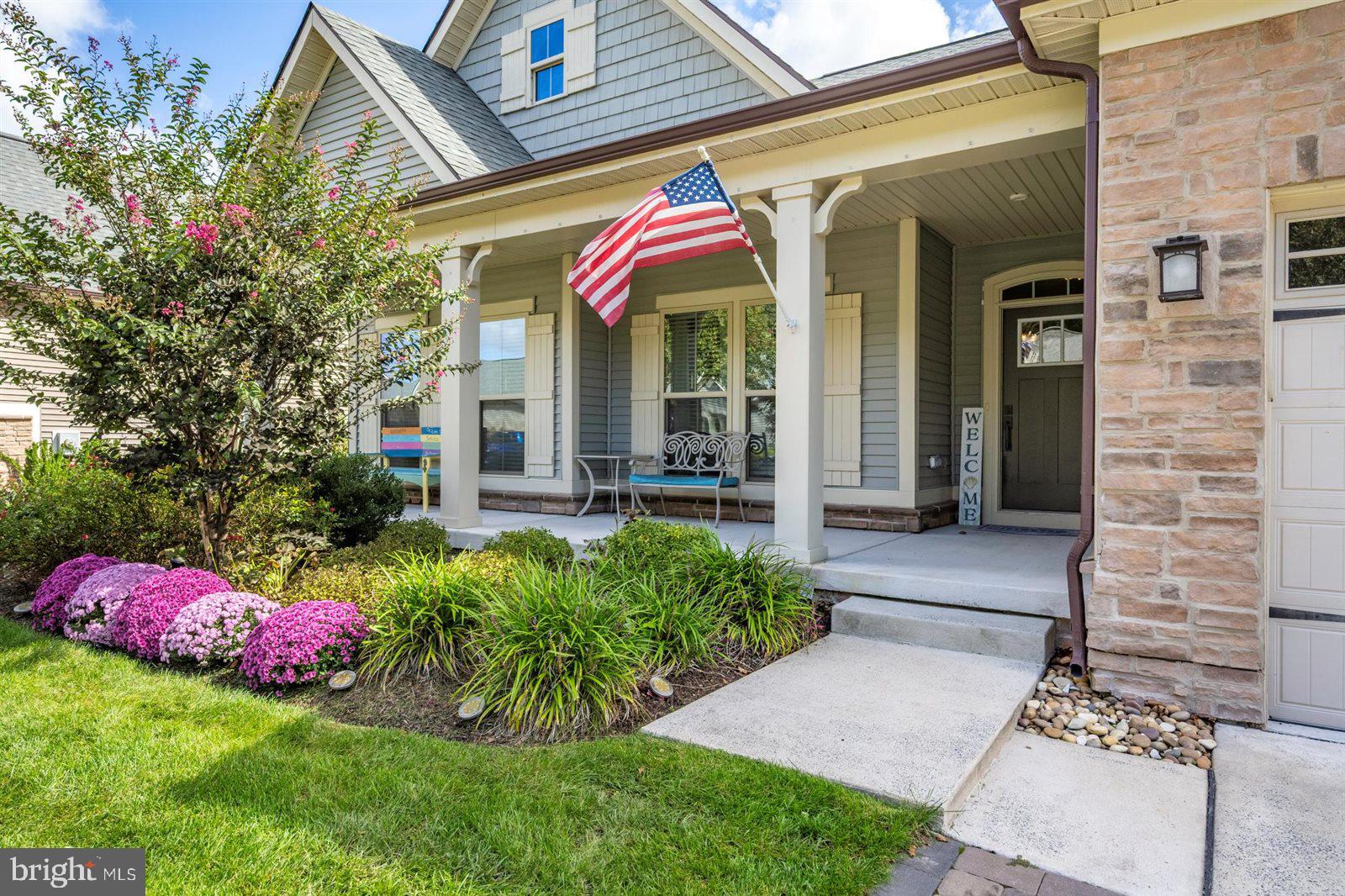 23546 Robalo Road Frankford, DE 19945 - Photo 7 of 78 a view of a house with potted plants