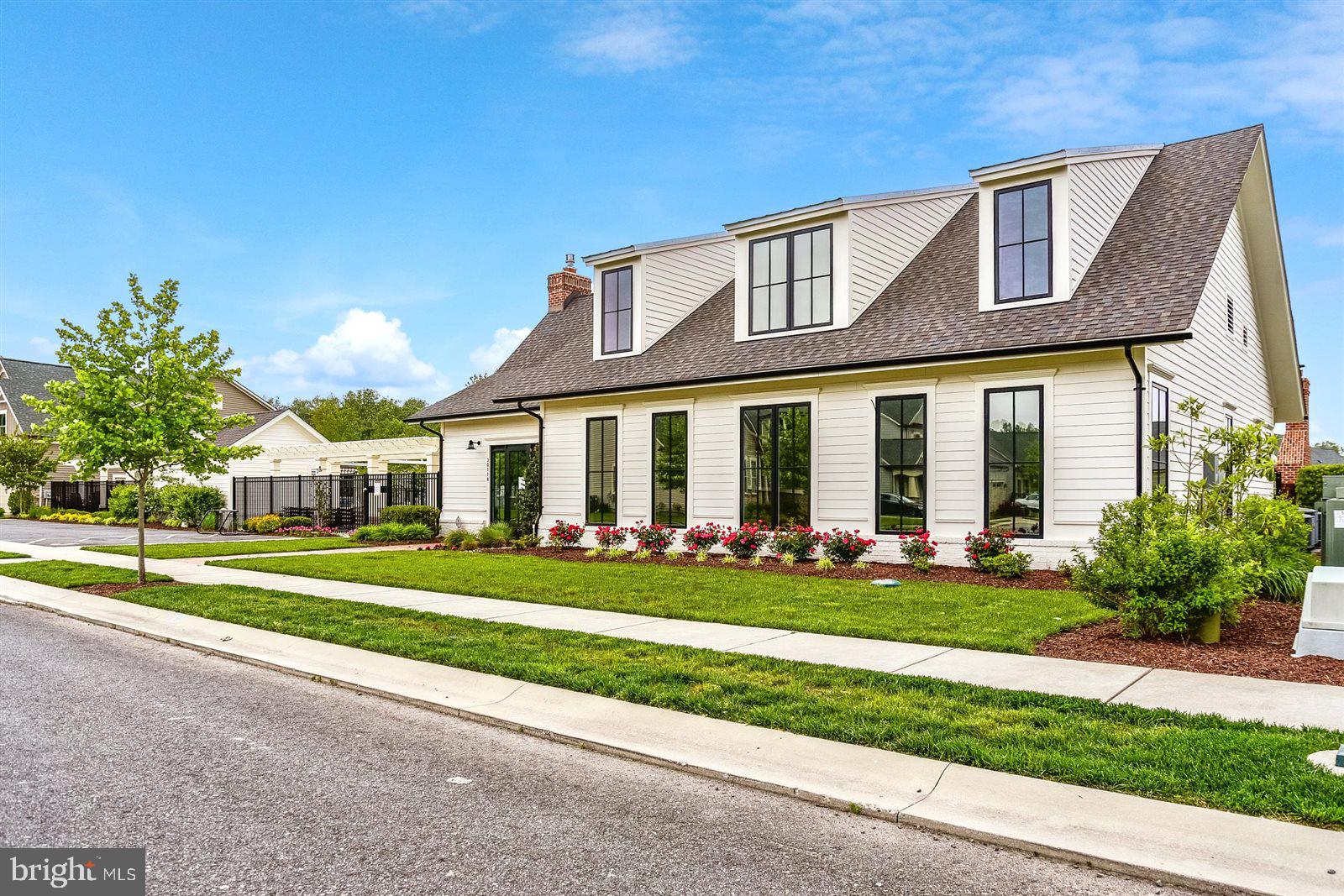 23546 Robalo Road Frankford, DE 19945 - Photo 72 of 78 front view of a house with a yard