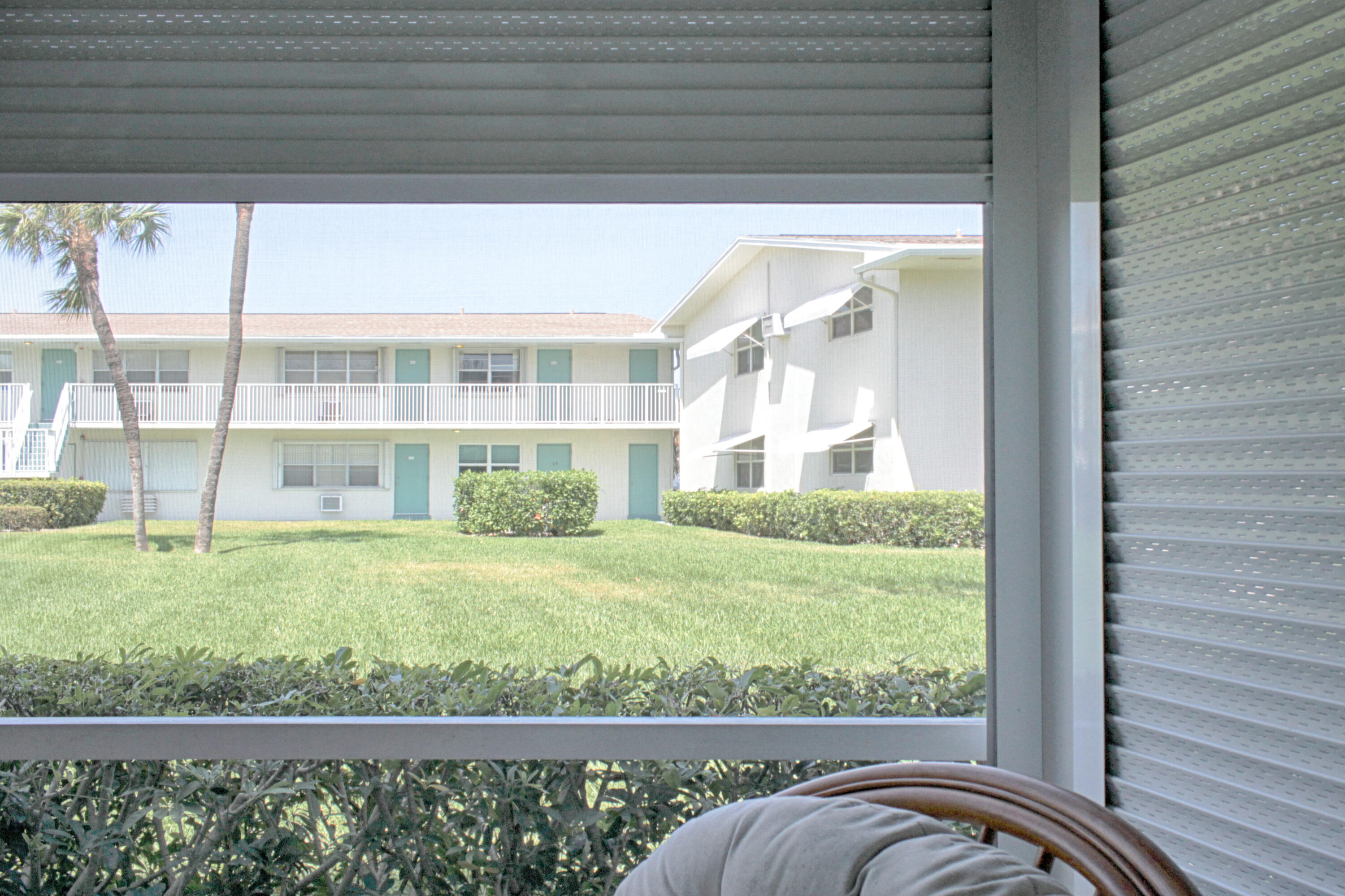 880 Horizon West, Unit 102 Boynton Beach, FL 33435 - Photo 22 of 34 a view of a large window and an outdoor view