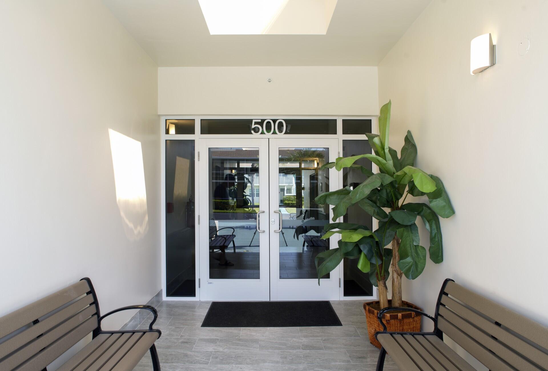 880 Horizon West, Unit 102 Boynton Beach, FL 33435 - Photo 25 of 34 a view of a entryway with wooden floor