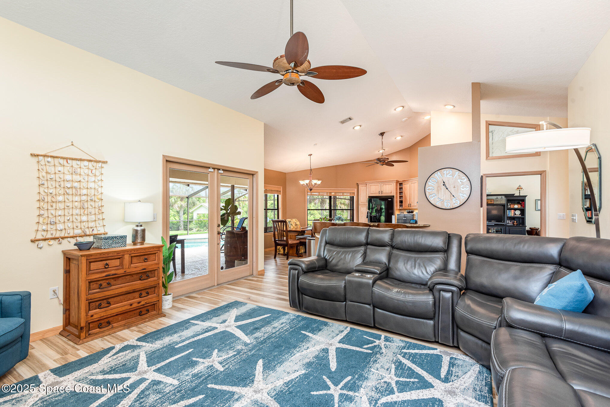 3750 Shady Run Road Melbourne, FL 32934 - Photo 14 of 50 a living room with furniture and a large window