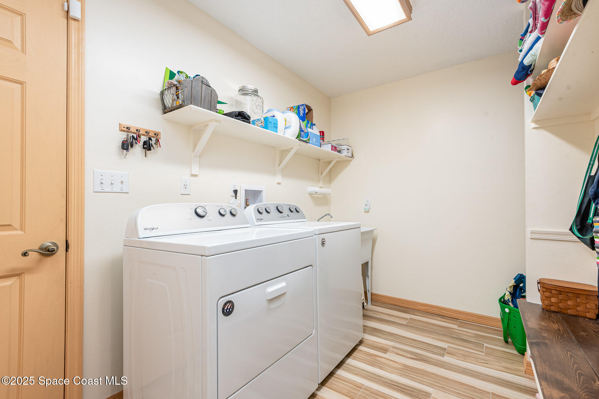 3750 Shady Run Road Melbourne, FL 32934 - Photo 29 of 50 a utility room with dryer and washer