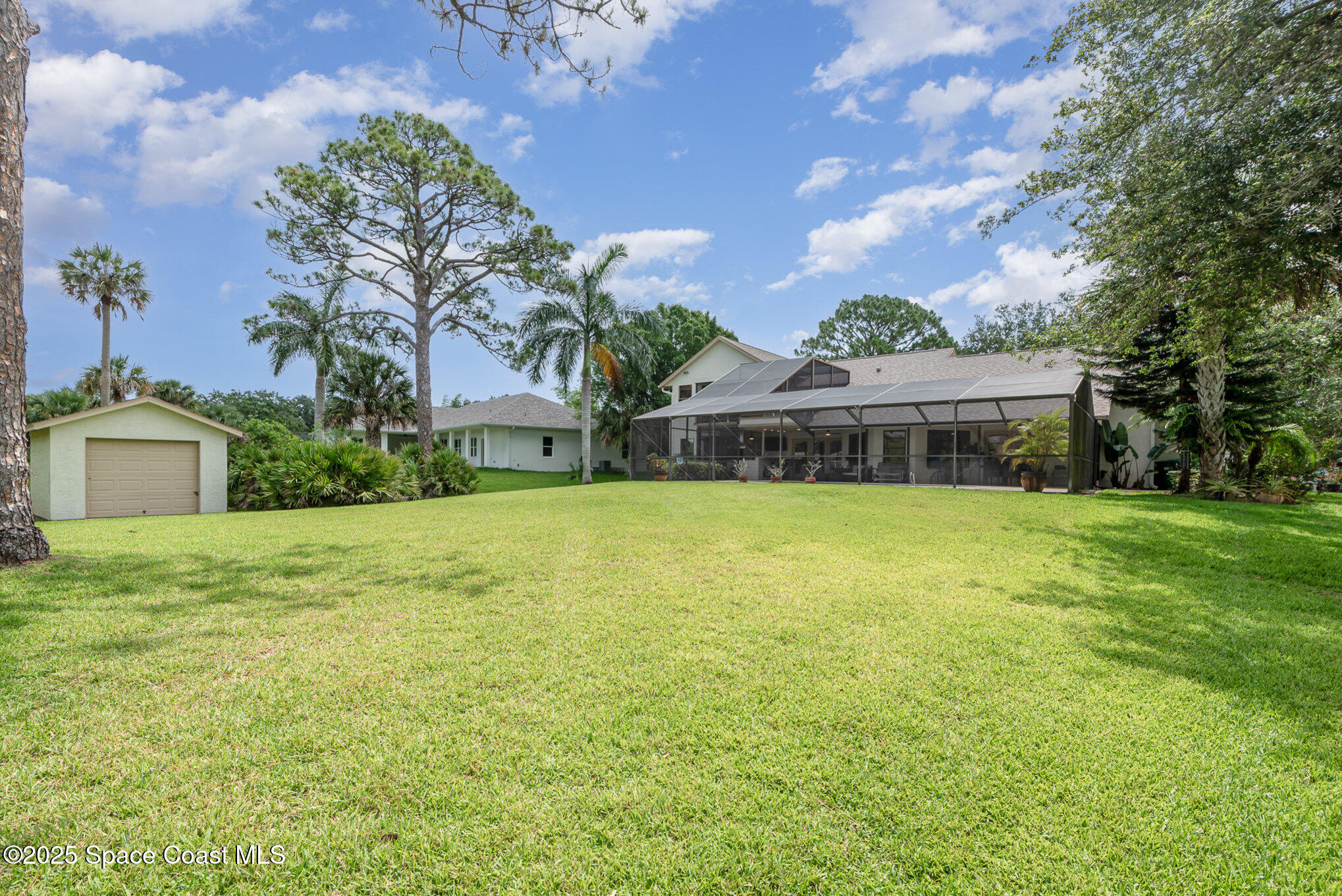 3750 Shady Run Road Melbourne, FL 32934 - Photo 31 of 50 a front view of house with yard and green space