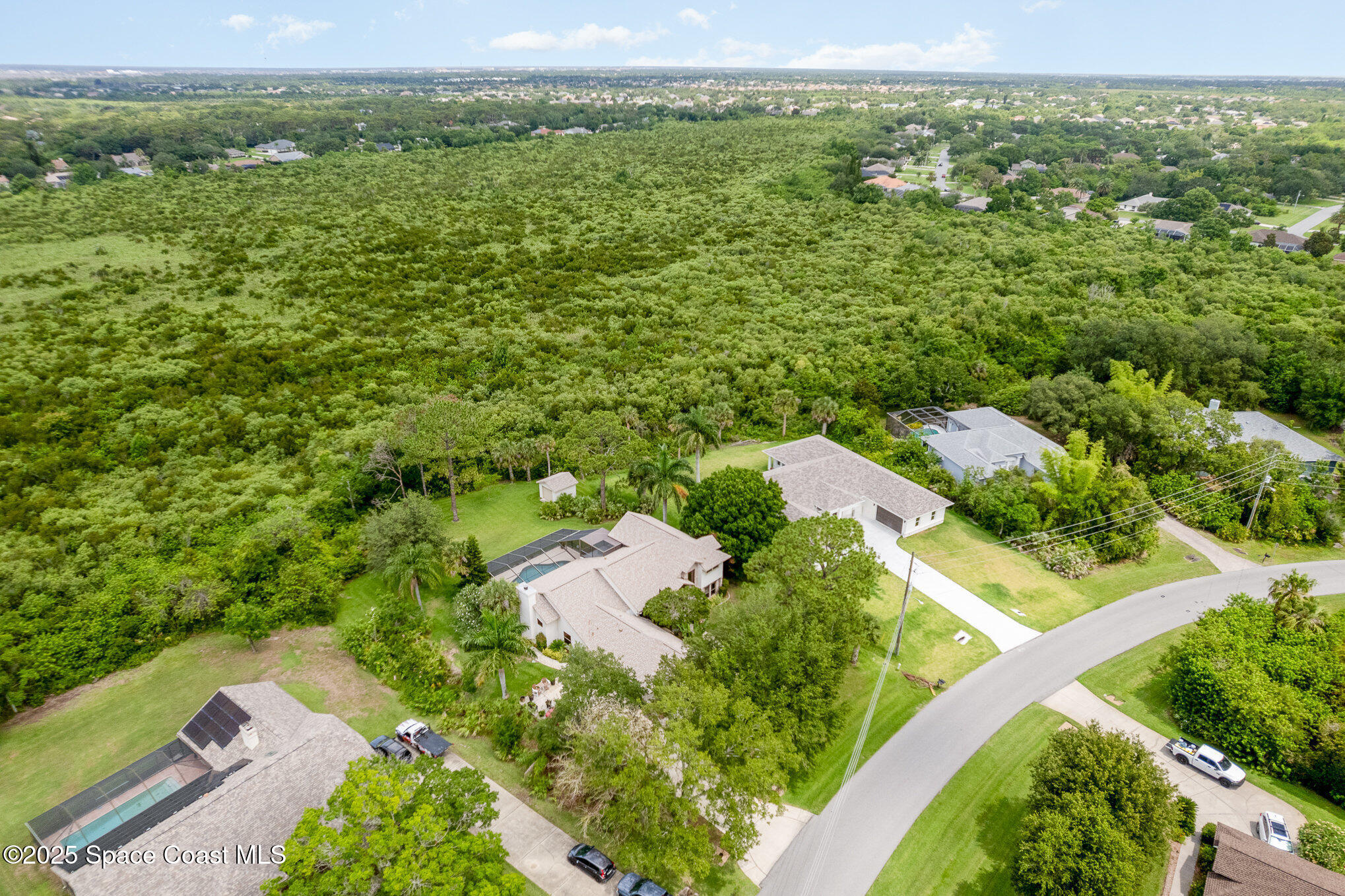 3750 Shady Run Road Melbourne, FL 32934 - Photo 40 of 50 an aerial view of residential houses with outdoor space