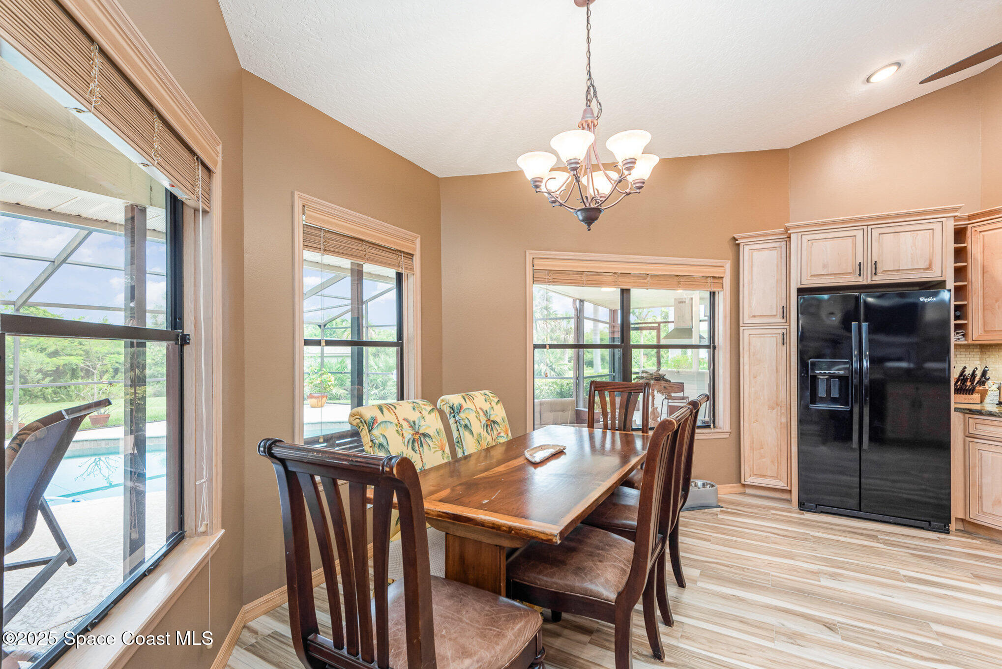 3750 Shady Run Road Melbourne, FL 32934 - Photo 10 of 50 a view of a dining room with furniture window and outside view