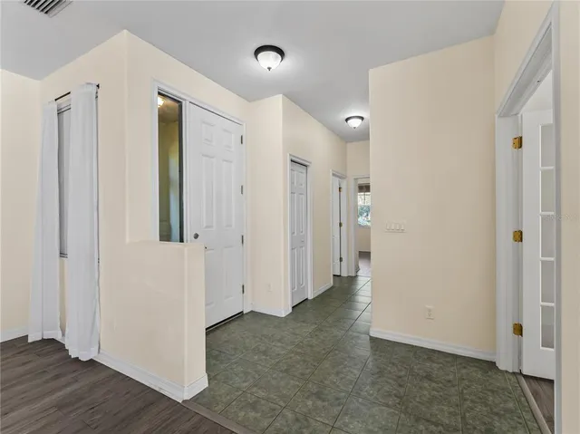a view of a livingroom with wooden floor