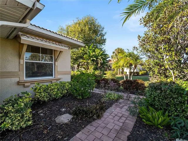 a house with a tree in the background