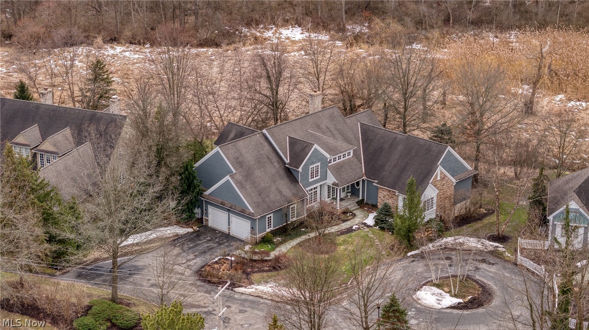 31900 Pinetree Road Pepper Pike, OH 44124 - Photo 42 of 43 Sited perfectly with a circular drive and natural landscape this unique gem is a rare find.
