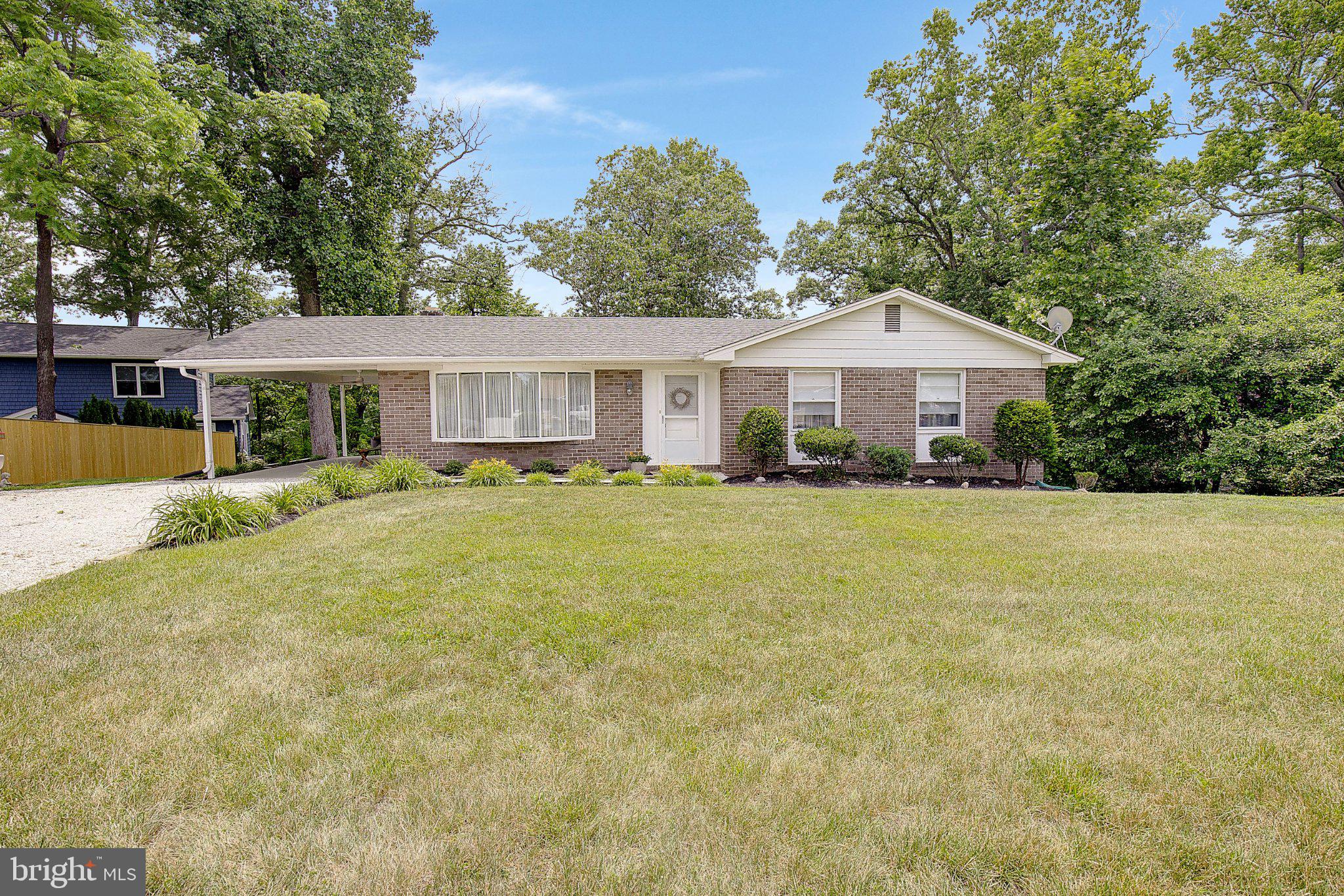 3088 Tudor Hall Road Riva, MD 21140 - Photo 3 of 62 Charming home with lush greenery.