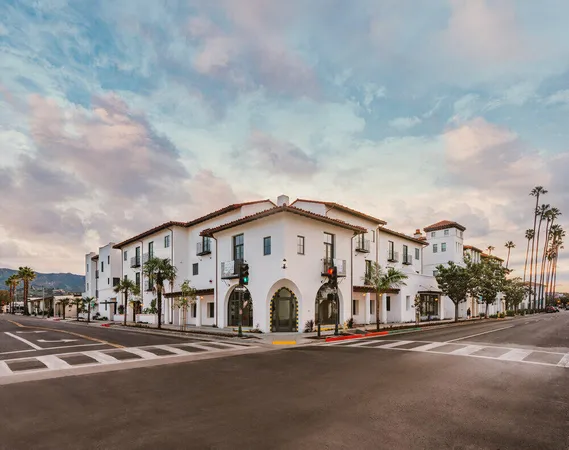 a view of a large building next to a road