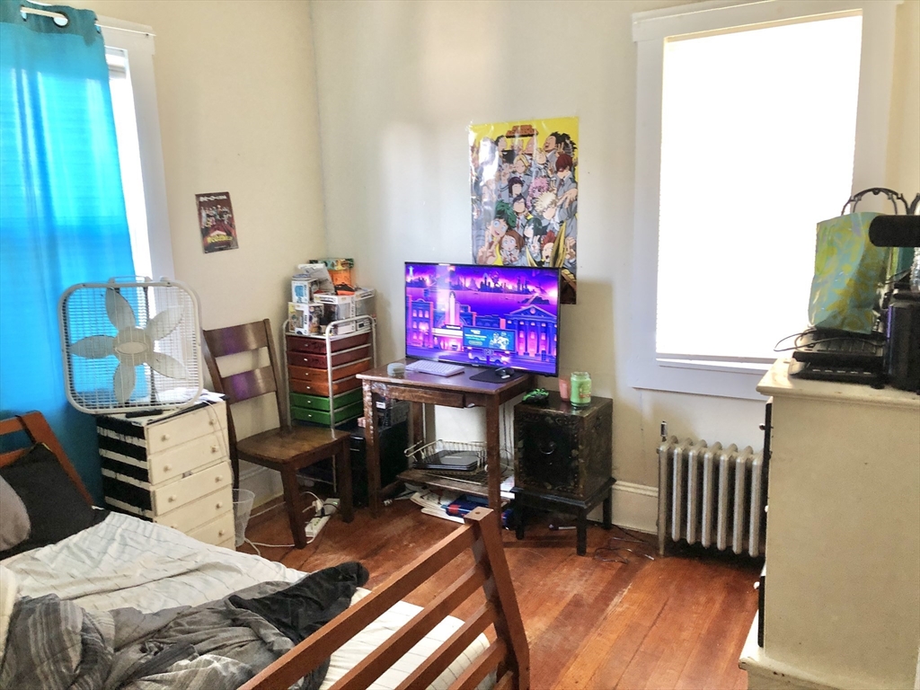 20-22 Hedge Road Plymouth, MA 02360 - Photo 15 of 29 a living room with furniture a flat screen tv and a window