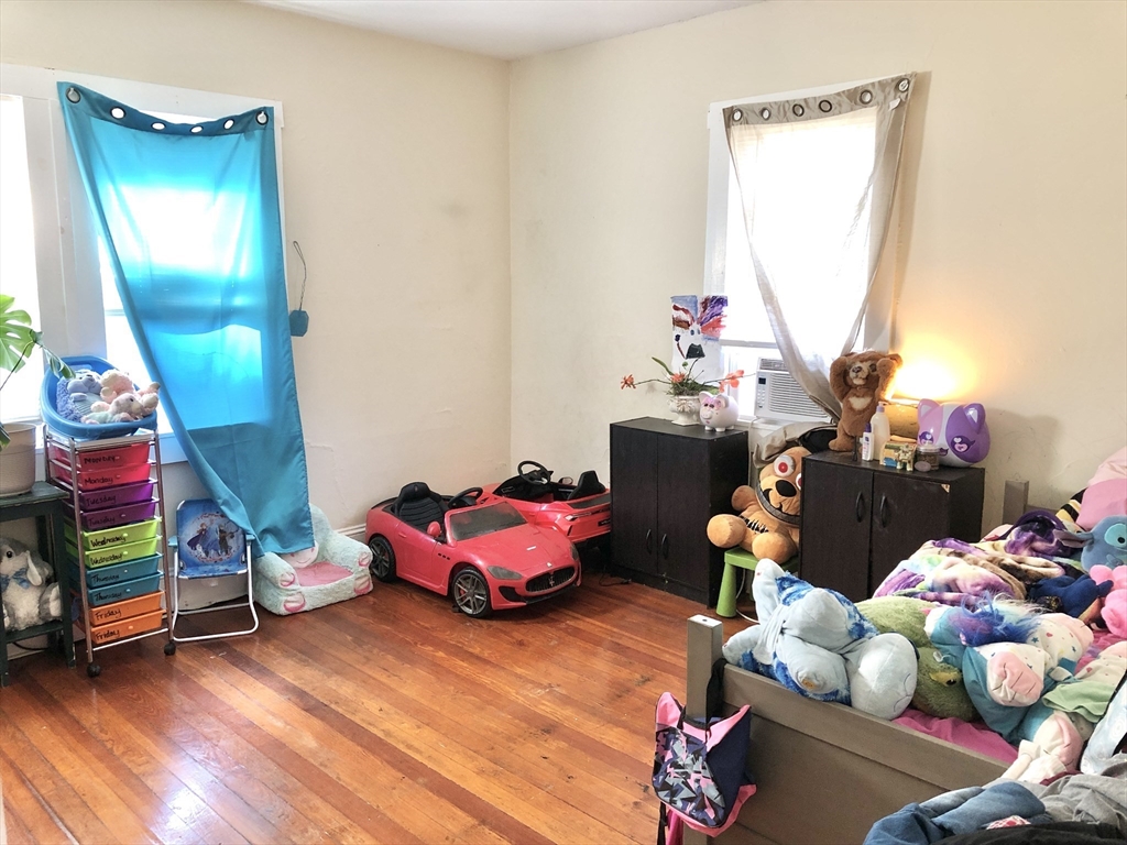 20-22 Hedge Road Plymouth, MA 02360 - Photo 16 of 29 a room with toys and a wooden floor