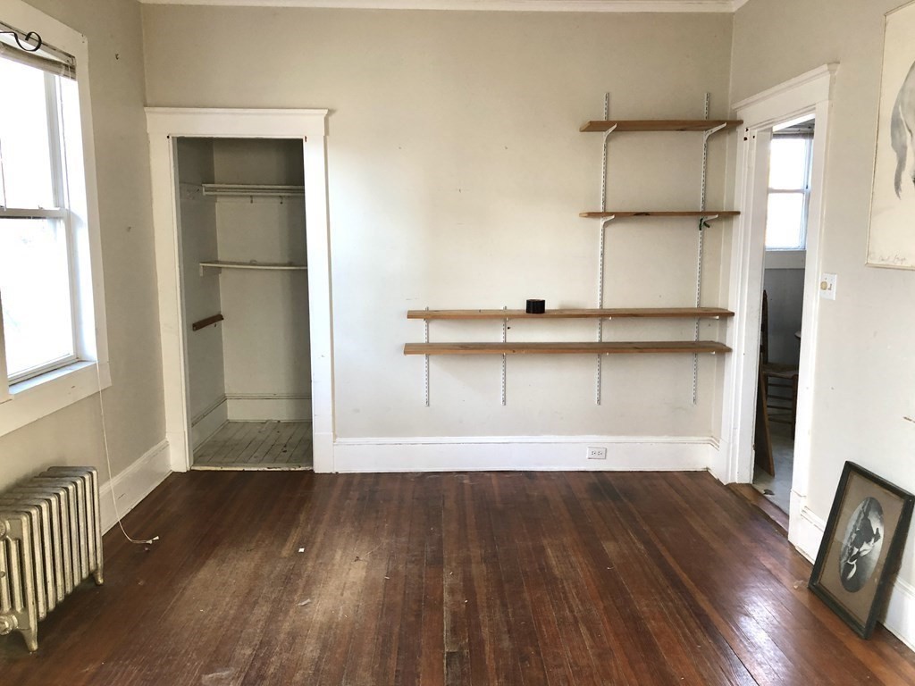 20-22 Hedge Road Plymouth, MA 02360 - Photo 7 of 29 a view of a kitchen with wooden floor and a window