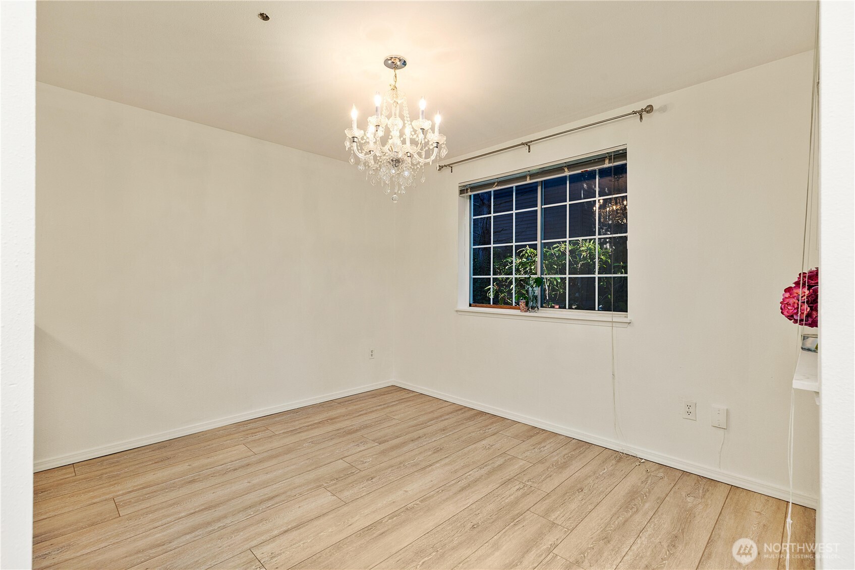 7453 Newcastle Golf Club Road, Unit G103 Newcastle, WA 98059 - Photo 16 of 37 wooden floor in an empty room with a window