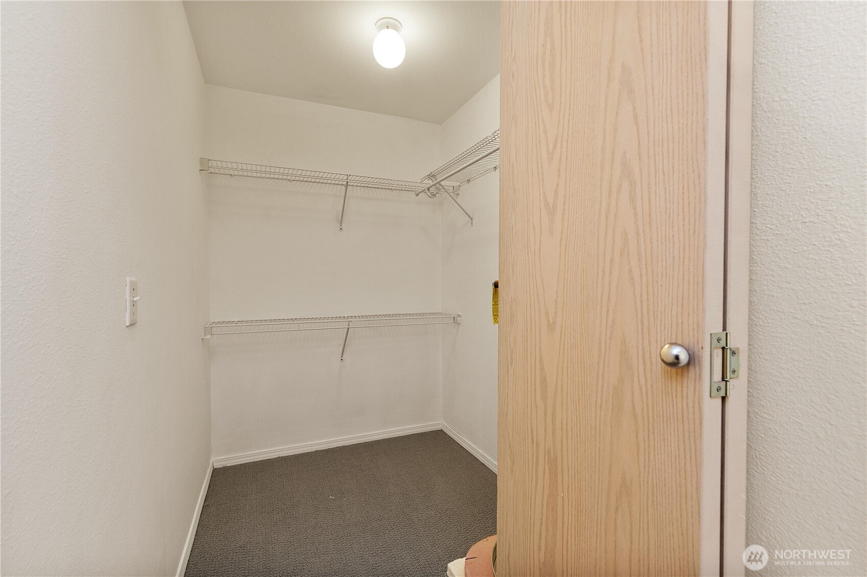 7453 Newcastle Golf Club Road, Unit G103 Newcastle, WA 98059 - Photo 17 of 37 a view of an empty walk in closet