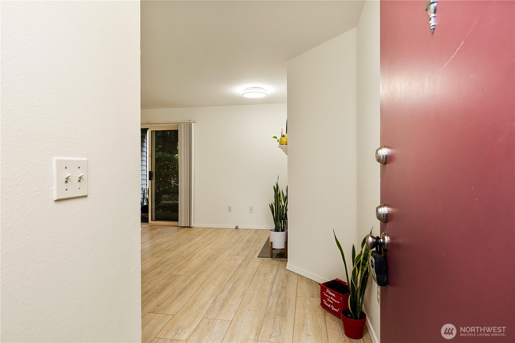 7453 Newcastle Golf Club Road, Unit G103 Newcastle, WA 98059 - Photo 3 of 37 a view of livingroom with furniture and wooden floor