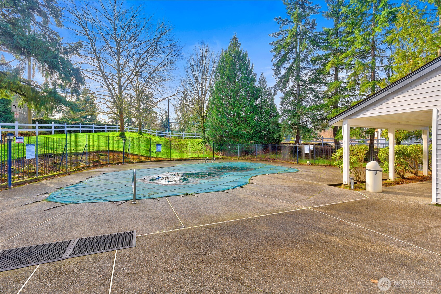 7453 Newcastle Golf Club Road, Unit G103 Newcastle, WA 98059 - Photo 34 of 37 a view of a playground with basketball court