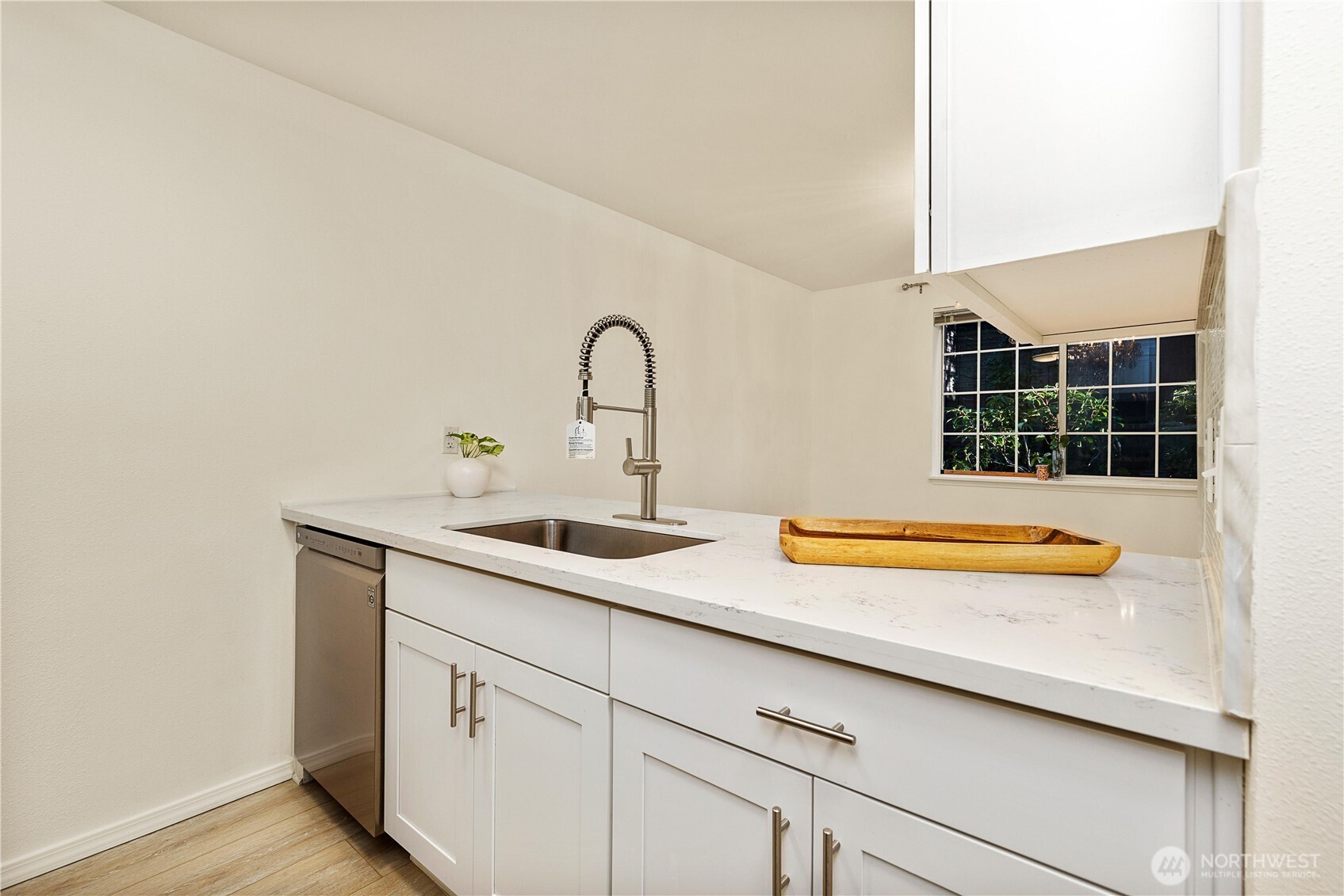 7453 Newcastle Golf Club Road, Unit G103 Newcastle, WA 98059 - Photo 10 of 37 a bathroom with a sink and a bathtub