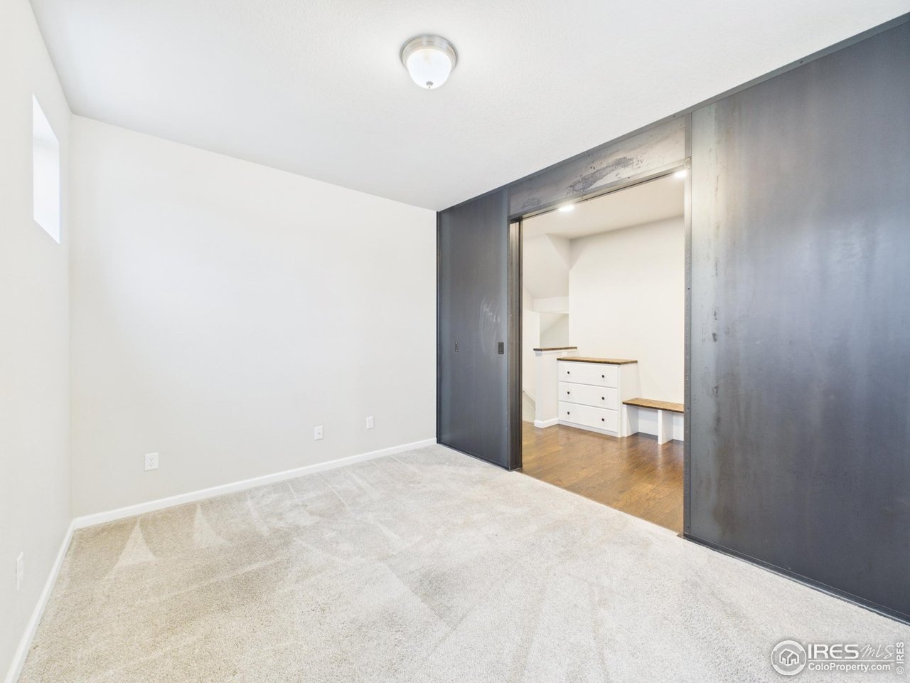 420 South 5th Street Berthoud, CO 80513 - Photo 21 of 47 a view of a room with a wardrobe space