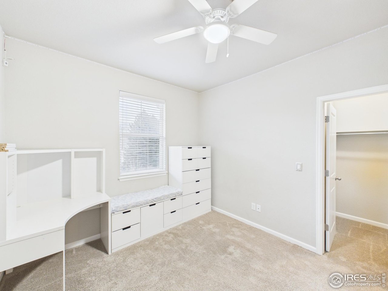 420 South 5th Street Berthoud, CO 80513 - Photo 33 of 47 an empty room with windows and fan